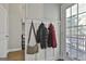 Mud room with access to the back deck and coat rack at 44 Willow Leaf Way, Sharpsburg, GA 30277