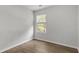 Bright bedroom with a window and neutral walls at 7234 Crestside Dr # 81, Austell, GA 30168