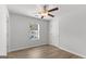 Bedroom featuring a ceiling fan, window and neutral wall color at 7236 Crestside Dr # 80, Austell, GA 30168