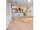 Finished basement featuring carpeted floors and access to the kitchen and bathroom at 201 Lanyard Loop, Peachtree City, GA 30269