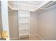 Bright closet space featuring white built-in shelving for maximum storage at 201 Lanyard Loop, Peachtree City, GA 30269