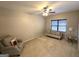 Bedroom with neutral carpet, a ceiling fan, and a single window at 34 Brittany Way, Palmetto, GA 30268