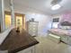 bedroom showing decorative furniture, two windows, and carpeted floors at 34 Brittany Way, Palmetto, GA 30268