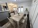 Elegant dining room features modern furnishings and decor, creating an inviting atmosphere for meals at 34 Brittany Way, Palmetto, GA 30268