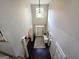 Elegant home foyer featuring dark wood floors, high ceilings, and abundant natural light at 34 Brittany Way, Palmetto, GA 30268