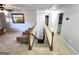Upstairs hallway with stair access to the first floor and entry to rooms at 34 Brittany Way, Palmetto, GA 30268