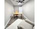 Modern home office with hardwood floors, desk, chair, and white shelving at 34 Brittany Way, Palmetto, GA 30268