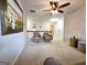 Loft area with neutral carpet, two chairs, and modern décor at 34 Brittany Way, Palmetto, GA 30268