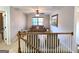 Loft area has a sofa with natural light coming from the window and modern décor at 34 Brittany Way, Palmetto, GA 30268