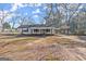 Charming single-story home featuring a covered porch and attached carport at 5211 Old Monticello Se St, Covington, GA 30014