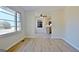 Bright dining room with large windows and sleek floors at 940 New Hope Rd, Fayetteville, GA 30214