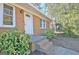 Close-up of the front entrance featuring a classic white door and brick steps at 940 New Hope Rd, Fayetteville, GA 30214