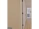 Bright hallway featuring hardwood floors and a glimpse into the kitchen at 940 New Hope Rd, Fayetteville, GA 30214