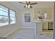 Eat-in kitchen featuring modern appliances, counter seating, and abundant natural light at 940 New Hope Rd, Fayetteville, GA 30214