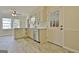 Modern kitchen features stainless appliances, quartz countertops, and tiled backsplash at 940 New Hope Rd, Fayetteville, GA 30214