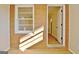 Sunlit room features wood floors and a bright window at 940 New Hope Rd, Fayetteville, GA 30214