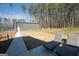 Inviting backyard with a patio, lounge chairs, and a view of the home's outbuilding at 337 Paynes Lake Rd, Carrollton, GA 30116