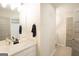 Well-lit bathroom featuring a quartz countertop and modern vanity at 337 Paynes Lake Rd, Carrollton, GA 30116