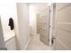 Bright bathroom with a tile floor and neutrally painted walls at 337 Paynes Lake Rd, Carrollton, GA 30116