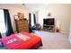 Bright bedroom with large windows and a comfortable bed and desk at 337 Paynes Lake Rd, Carrollton, GA 30116