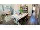 Formal dining area showcasing stylish decor, an overhead light, and hardwood floors at 337 Paynes Lake Rd, Carrollton, GA 30116