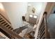 Bright foyer with hardwood floors, staircase, and stylish decor at 337 Paynes Lake Rd, Carrollton, GA 30116