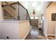 Grand foyer featuring high ceilings, decorative accents, and a staircase with wrought iron railings at 337 Paynes Lake Rd, Carrollton, GA 30116