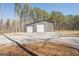 Exterior view of a large gray garage with two bays at 337 Paynes Lake Rd, Carrollton, GA 30116