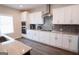 Bright kitchen boasts stainless steel appliances, gray backsplash and beautiful counters at 337 Paynes Lake Rd, Carrollton, GA 30116