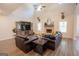 Bright and airy living room with a brick fireplace, hardwood floors, and high ceilings at 337 Paynes Lake Rd, Carrollton, GA 30116