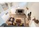 Open-concept living room with hardwood floors, fireplace, and elegant furnishings at 337 Paynes Lake Rd, Carrollton, GA 30116