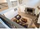 Open-concept living room with hardwood floors, fireplace, and elegant furnishings at 337 Paynes Lake Rd, Carrollton, GA 30116