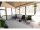 Enclosed porch with outdoor seating and a backyard view at 337 Paynes Lake Rd, Carrollton, GA 30116