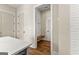 Hallway with a built-in bench and coat hooks for storage at 165 2Nd St, Fayetteville, GA 30214