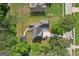 An aerial view of the home showcasing the landscaping, the roofline, and the driveway at 2768 Southpark Sw Blvd, Conyers, GA 30094