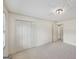 Spacious bedroom with neutral walls, plush carpeting, a closet and bright natural light at 2768 Southpark Sw Blvd, Conyers, GA 30094
