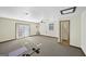Bonus room with lots of windows, ceiling fan and access to the half bathroom at 2768 Southpark Sw Blvd, Conyers, GA 30094