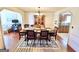 Traditional dining room with wood table, chairs, and decorative rug at 2768 Southpark Sw Blvd, Conyers, GA 30094