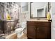 Quaint bathroom featuring granite countertops, a decorative shower curtain and earth-tone tile flooring at 6 Water Oak Dr, Sharpsburg, GA 30277