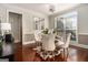 Elegant dining room with a chandelier and a round table with decorative accents at 6 Water Oak Dr, Sharpsburg, GA 30277