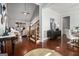 Open-concept interior with dining area, staircase, and views to the living room at 6 Water Oak Dr, Sharpsburg, GA 30277