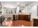 Bright kitchen featuring stainless appliances, granite countertops, and an eat-in area with views of the backyard at 6 Water Oak Dr, Sharpsburg, GA 30277