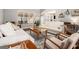 Cozy living room with a sitting area, large windows and nice decor at 6 Water Oak Dr, Sharpsburg, GA 30277