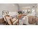 Comfortable living room area featuring natural light and stylish furnishings at 6 Water Oak Dr, Sharpsburg, GA 30277