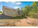 Expansive backyard with a view of the screened-in porch at 225 Chinns Way, Hampton, GA 30228
