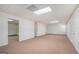 Spacious basement with neutral carpet and multiple doorways at 225 Chinns Way, Hampton, GA 30228