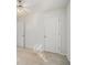 Neutral bedroom with two doors and natural light at 225 Chinns Way, Hampton, GA 30228