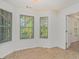 Bright breakfast nook featuring tile flooring and natural light at 225 Chinns Way, Hampton, GA 30228