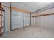 Spacious one-car garage with a clean concrete floor at 225 Chinns Way, Hampton, GA 30228