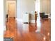 Shiny hard wood flooring in a bright living room and white baseboards at 956 Shadowford Fls, Lithonia, GA 30058